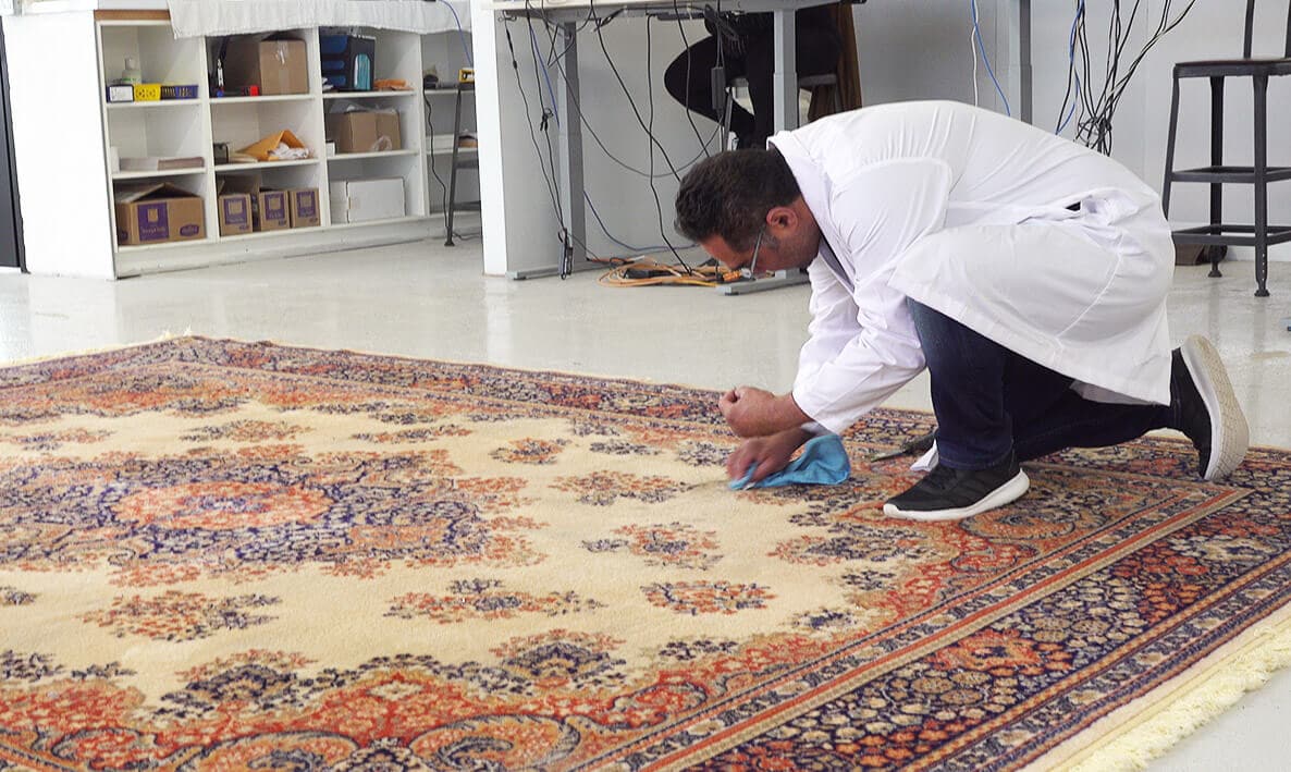 How do you remove stains from rugs?